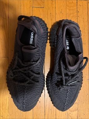 Yeezy Black Knit Low-Top Sneakers with Subtle Red Accent